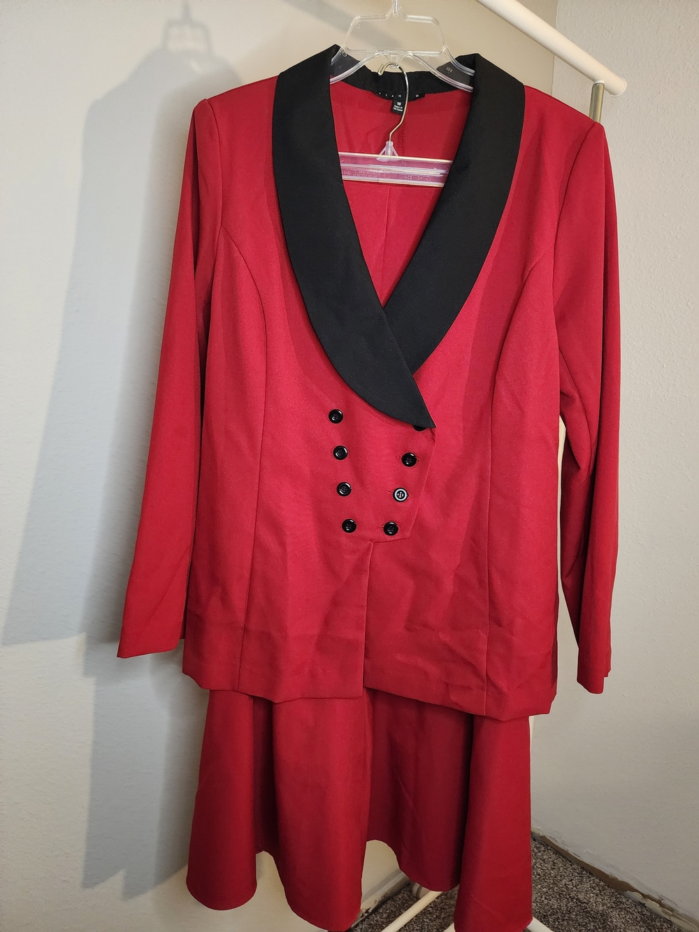 Tiana B. Red Jacket with Black Trim And Matching Flair Skirt.